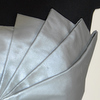 Detail- Brautmode Couture - pompöses farbiges Brautkleid in silber-grau mit langer Schleppe und aufwendiger Corsage